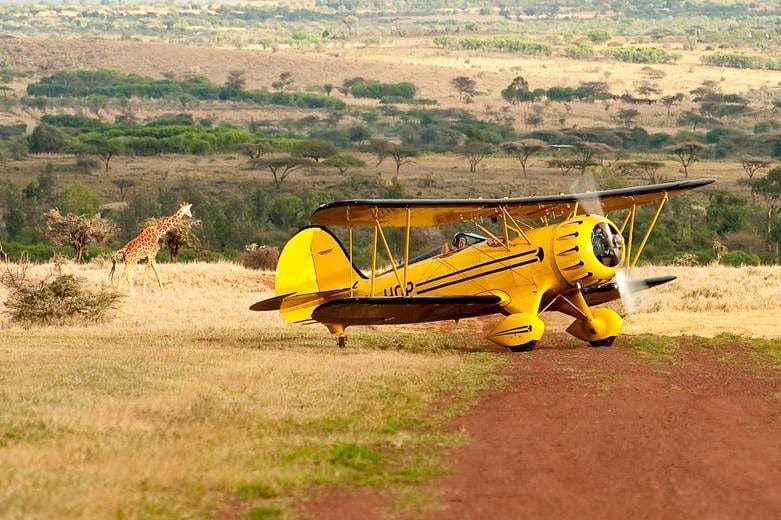 Vuelo en biplano en la sabana