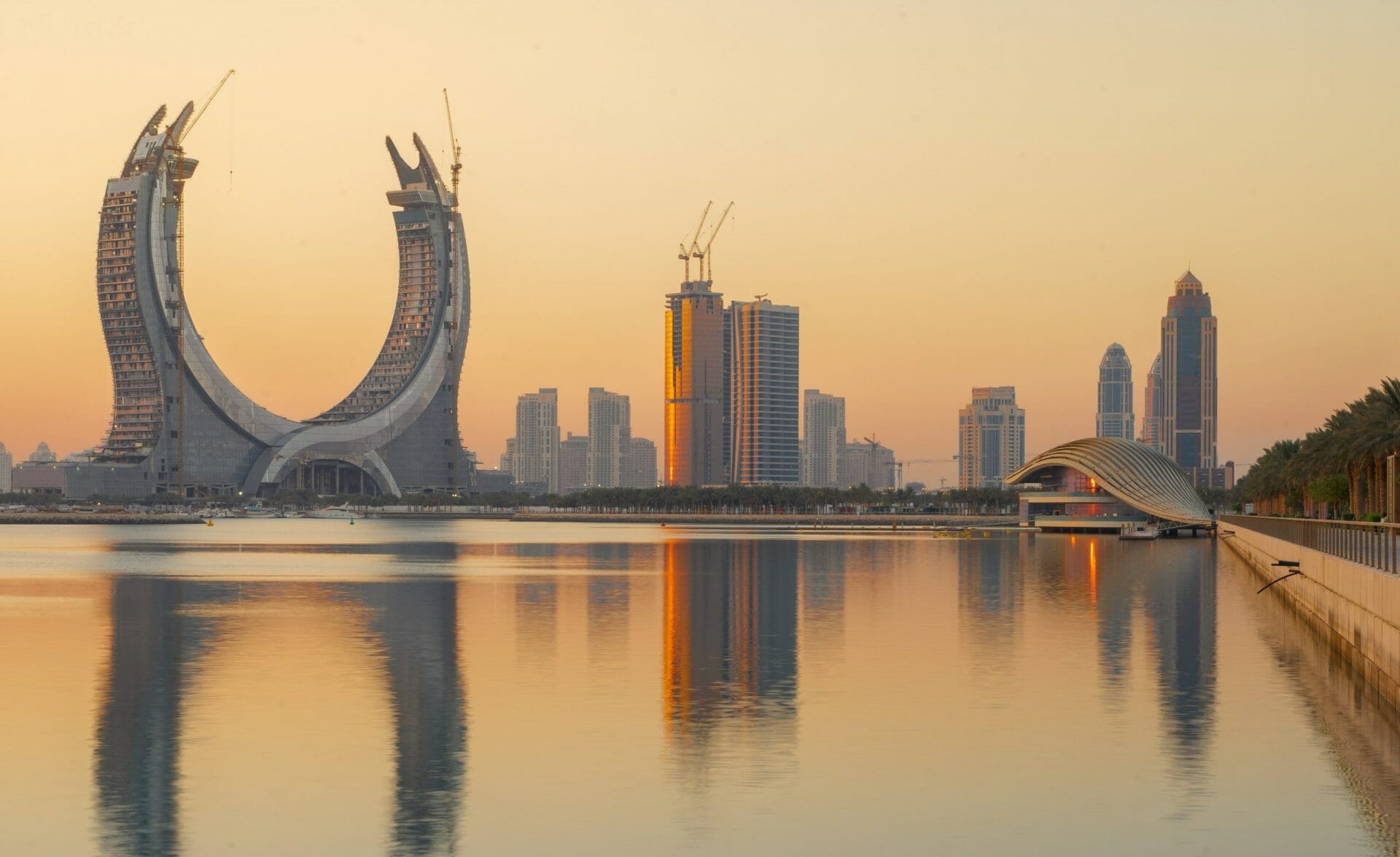 The beautiful newly developing city with many skyscrapers , shot during sunrise