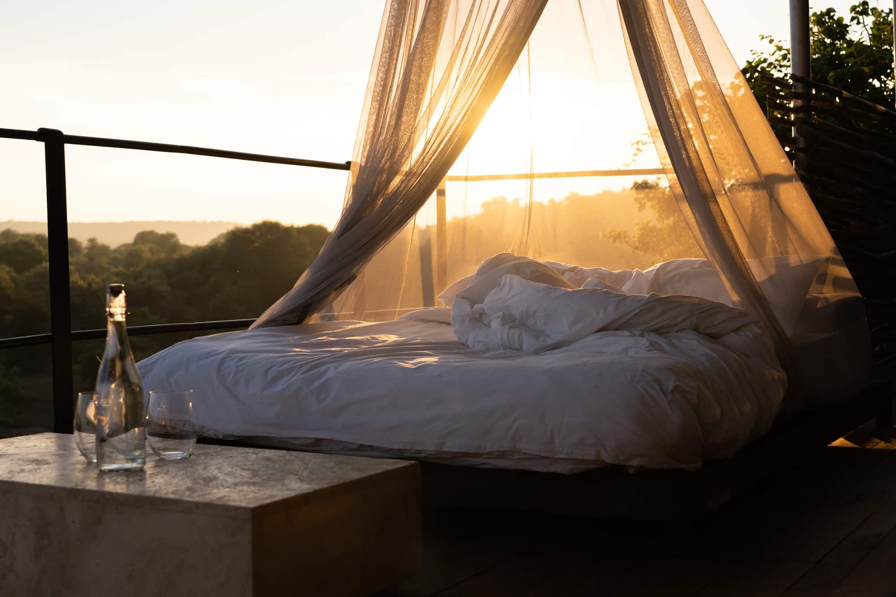 Singita Lebombo Lodge atardecer en terraza_Ross Couper, Sudáfrica